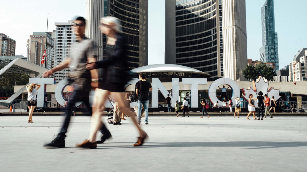 Tourist Walking Toronto Landmark Canada by Dan-Newman in Unsplash