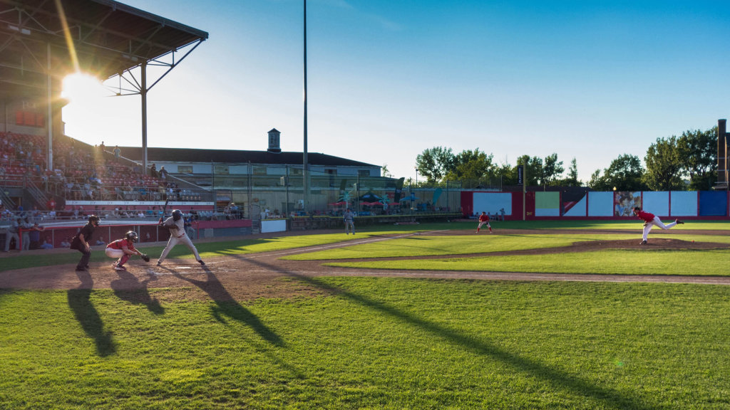 Baseball Game Field Players Playing by Pierre-Etienne in Unsplash