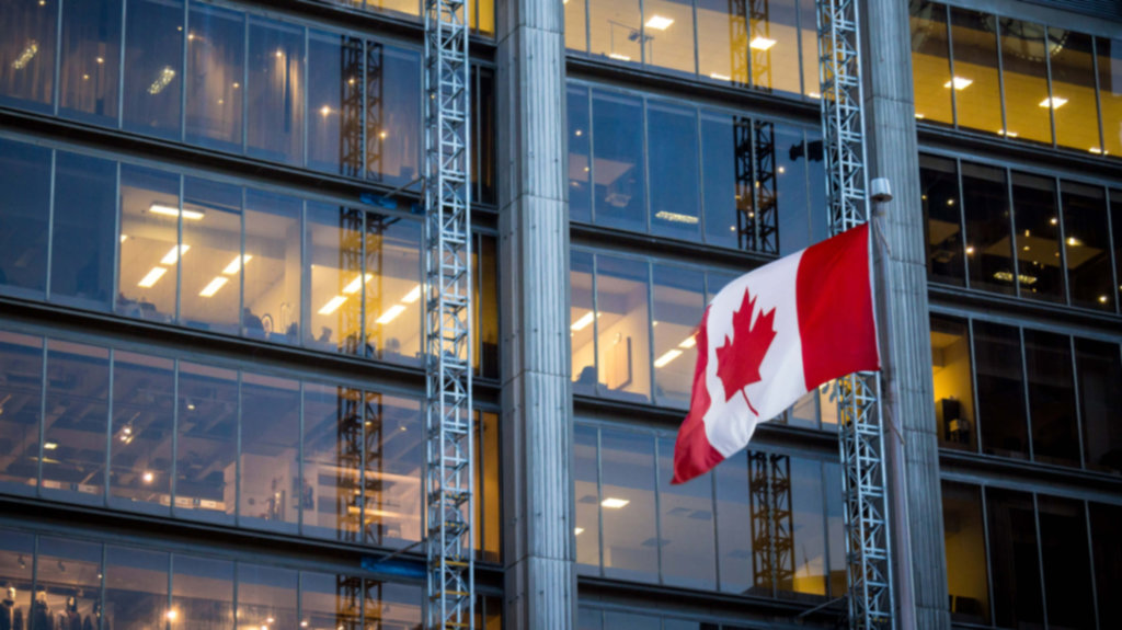 Canadian-Flag-In front-Modern-Commercial-Building-Blur